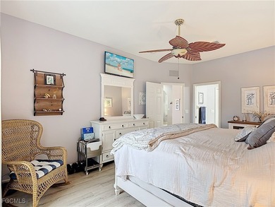 Expanded IBIS II pool home with serene lake and fountain views on Herons Glen Golf and Country Club in Florida - for sale on GolfHomes.com, golf home, golf lot