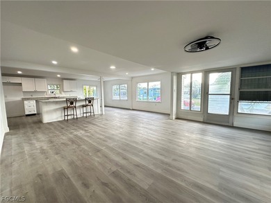 Move into a home that feels like brand-new construction in the on Riverbend Golf and Country Club in Florida - for sale on GolfHomes.com, golf home, golf lot