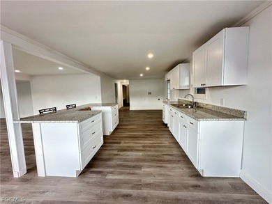 Move into a home that feels like brand-new construction in the on Riverbend Golf and Country Club in Florida - for sale on GolfHomes.com, golf home, golf lot