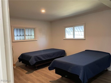 Move into a home that feels like brand-new construction in the on Riverbend Golf and Country Club in Florida - for sale on GolfHomes.com, golf home, golf lot