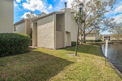 FIRST FLOOR CORNER UNIT! ~ AC CHANGED IN 2022. WATERFRONT VIEW on Emerald Greens Golf Resort and Country Club in Florida - for sale on GolfHomes.com, golf home, golf lot