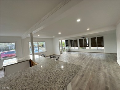 Move into a home that feels like brand-new construction in the on Riverbend Golf and Country Club in Florida - for sale on GolfHomes.com, golf home, golf lot