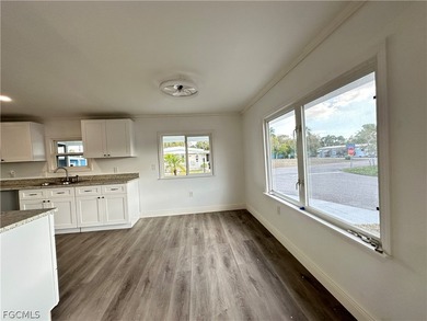 Move into a home that feels like brand-new construction in the on Riverbend Golf and Country Club in Florida - for sale on GolfHomes.com, golf home, golf lot