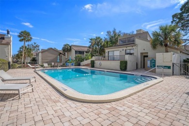 FIRST FLOOR CORNER UNIT! ~ AC CHANGED IN 2022. WATERFRONT VIEW on Emerald Greens Golf Resort and Country Club in Florida - for sale on GolfHomes.com, golf home, golf lot