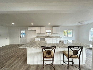 Move into a home that feels like brand-new construction in the on Riverbend Golf and Country Club in Florida - for sale on GolfHomes.com, golf home, golf lot