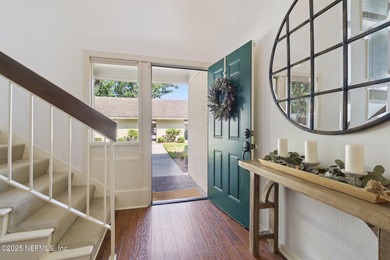 Beautifully updated end-unit in Deerwood's guard-gated community on The Deerwood Country Club in Florida - for sale on GolfHomes.com, golf home, golf lot