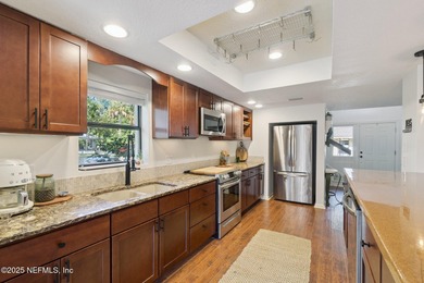 Beautifully updated end-unit in Deerwood's guard-gated community on The Deerwood Country Club in Florida - for sale on GolfHomes.com, golf home, golf lot