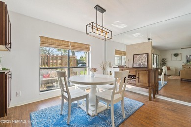 Beautifully updated end-unit in Deerwood's guard-gated community on The Deerwood Country Club in Florida - for sale on GolfHomes.com, golf home, golf lot