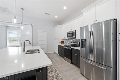 Coastal Charm on a Quiet Cul-de-Sac - NO FLOOD INSURANCE on Rotonda Golf and Country Club The Links Course in Florida - for sale on GolfHomes.com, golf home, golf lot