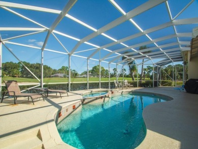 It's a fabulous golf course view through a multitude of sliding on The Legacy Golf and Tennis Club in Florida - for sale on GolfHomes.com, golf home, golf lot