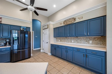 Welcome to resort style living in this impeccably maintained on Huntington Hills Golf and Country Club in Florida - for sale on GolfHomes.com, golf home, golf lot