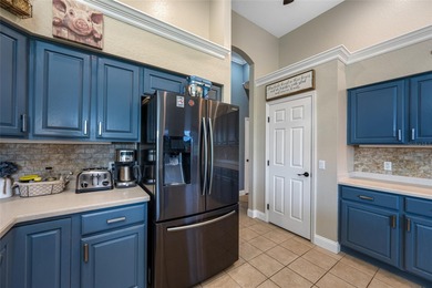 Welcome to resort style living in this impeccably maintained on Huntington Hills Golf and Country Club in Florida - for sale on GolfHomes.com, golf home, golf lot