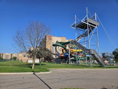 Relax and getaway to your vacation Villa. Bring the kids to on Coldwater Canyon Golf Course in Wisconsin - for sale on GolfHomes.com, golf home, golf lot