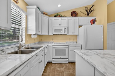 FABULOUS 3/2 Bougainvillea Designer featuring a SPACIOUS FLORIDA on El Diablo Executive Golf Course in Florida - for sale on GolfHomes.com, golf home, golf lot