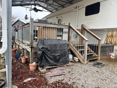 Check out this perfect set up for summer fun! Two camping lots on Linn Valley Lakes - Deer Trace Golf Course in Kansas - for sale on GolfHomes.com, golf home, golf lot