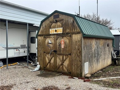 Check out this perfect set up for summer fun! Two camping lots on Linn Valley Lakes - Deer Trace Golf Course in Kansas - for sale on GolfHomes.com, golf home, golf lot