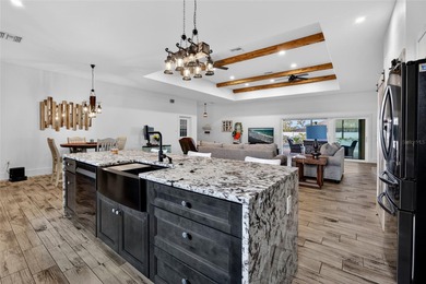 OVERSIZED LOT! UNIQUE 3 BEDROOM PLUS OFFICE, 3 BATH, 3 CAR on Riverwood Golf Club in Florida - for sale on GolfHomes.com, golf home, golf lot