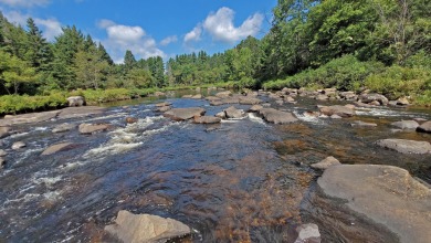 Riverfront building site along the Cedar River with over 3.5 on Cedar River Golf Course in New York - for sale on GolfHomes.com, golf home, golf lot