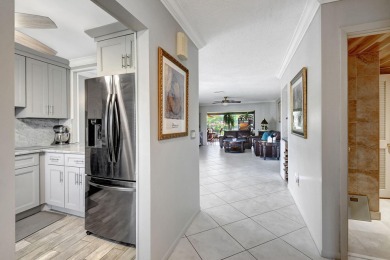 This beautiful 2nd-floor corner unit in Fairways Green, Boca on Boca Lago Golf and Country Club in Florida - for sale on GolfHomes.com, golf home, golf lot