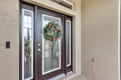 Welcome to a life that feels like vacation every day. Nestled in on Arlington Ridge Golf Club in Florida - for sale on GolfHomes.com, golf home, golf lot