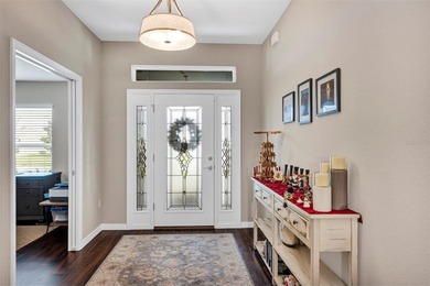 Welcome to a life that feels like vacation every day. Nestled in on Arlington Ridge Golf Club in Florida - for sale on GolfHomes.com, golf home, golf lot