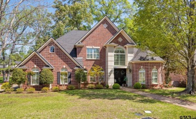Discover refined living in this elegant residence nestled within on Hollytree Country Club in Texas - for sale on GolfHomes.com, golf home, golf lot