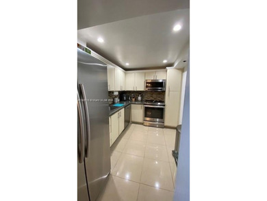 Spectacular well kept partially remodeled 2-bedroom, 2-bathroom on Pembroke Lakes Golf Club in Florida - for sale on GolfHomes.com, golf home, golf lot