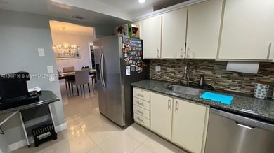 Spectacular well kept partially remodeled 2-bedroom, 2-bathroom on Pembroke Lakes Golf Club in Florida - for sale on GolfHomes.com, golf home, golf lot