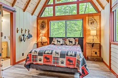 Say hello to summer at Wilderness Escape, a charming Innsbrook on Innsbrook Resort Golf Course in Missouri - for sale on GolfHomes.com, golf home, golf lot