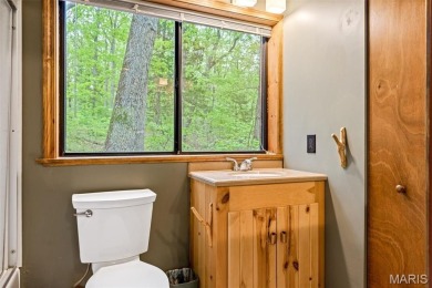 Say hello to summer at Wilderness Escape, a charming Innsbrook on Innsbrook Resort Golf Course in Missouri - for sale on GolfHomes.com, golf home, golf lot