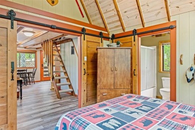 Say hello to summer at Wilderness Escape, a charming Innsbrook on Innsbrook Resort Golf Course in Missouri - for sale on GolfHomes.com, golf home, golf lot