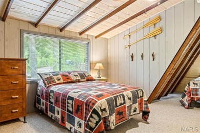 Say hello to summer at Wilderness Escape, a charming Innsbrook on Innsbrook Resort Golf Course in Missouri - for sale on GolfHomes.com, golf home, golf lot