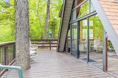 Say hello to summer at Wilderness Escape, a charming Innsbrook on Innsbrook Resort Golf Course in Missouri - for sale on GolfHomes.com, golf home, golf lot