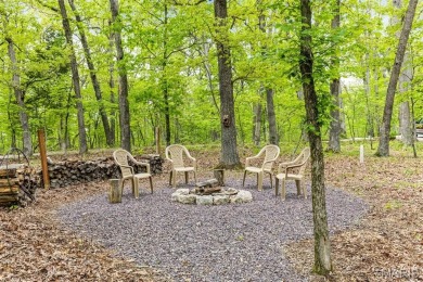 Say hello to summer at Wilderness Escape, a charming Innsbrook on Innsbrook Resort Golf Course in Missouri - for sale on GolfHomes.com, golf home, golf lot