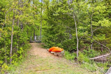Say hello to summer at Wilderness Escape, a charming Innsbrook on Innsbrook Resort Golf Course in Missouri - for sale on GolfHomes.com, golf home, golf lot