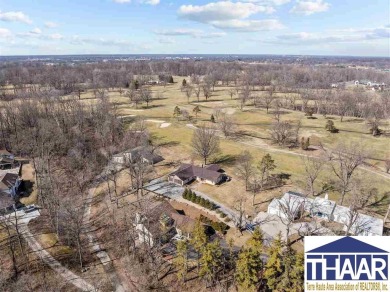 Discover an exceptional, executive property located on hole #14 on Country Club of Terre Haute in Indiana - for sale on GolfHomes.com, golf home, golf lot