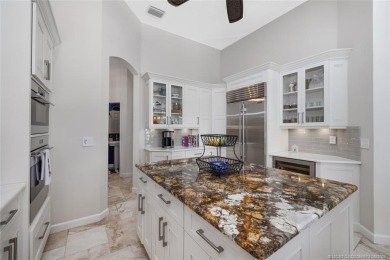 AMAZING show stopper 3B/3.5ba/2car gar., DEN & golf cart bay on Monarch Country Club in Florida - for sale on GolfHomes.com, golf home, golf lot