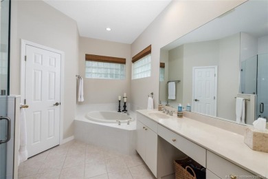 AMAZING show stopper 3B/3.5ba/2car gar., DEN & golf cart bay on Monarch Country Club in Florida - for sale on GolfHomes.com, golf home, golf lot