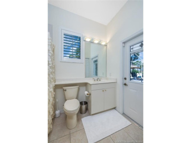 AMAZING show stopper 3B/3.5ba/2car gar., DEN & golf cart bay on Monarch Country Club in Florida - for sale on GolfHomes.com, golf home, golf lot