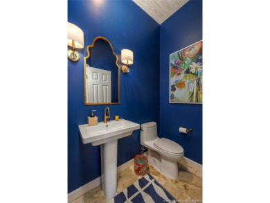 AMAZING show stopper 3B/3.5ba/2car gar., DEN & golf cart bay on Monarch Country Club in Florida - for sale on GolfHomes.com, golf home, golf lot