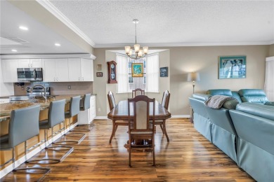 YOUR FLORIDA DREAM COMES TRUE - COMPLETELY REMODELED WATERFRONT on Seminole Lake Country Club in Florida - for sale on GolfHomes.com, golf home, golf lot
