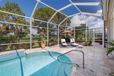 AMAZING show stopper 3B/3.5ba/2car gar., DEN & golf cart bay on Monarch Country Club in Florida - for sale on GolfHomes.com, golf home, golf lot