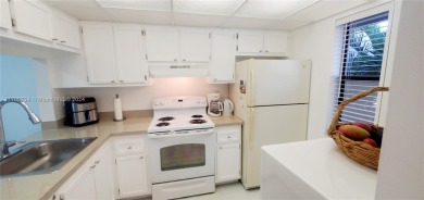 BEAUTIFUL TURN KEY 2nd floor CONDO in a 55+ active community on Sunrise Lakes Phase IV Golf Course in Florida - for sale on GolfHomes.com, golf home, golf lot