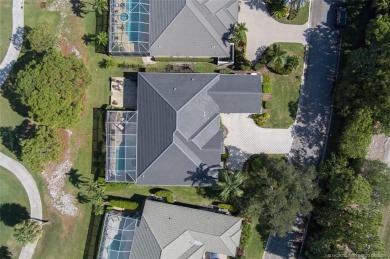 AMAZING show stopper 3B/3.5ba/2car gar., DEN & golf cart bay on Monarch Country Club in Florida - for sale on GolfHomes.com, golf home, golf lot