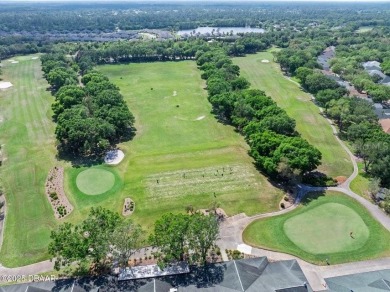 One or more photo(s) has been virtually staged. HALIFAX on Halifax Plantation Golf Club in Florida - for sale on GolfHomes.com, golf home, golf lot