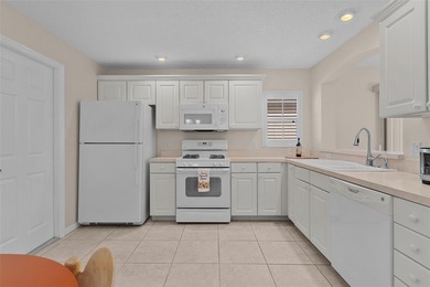 LOCATION! Welcome to this beautiful 2-BEDROOM COURTYARD VILLA in on Bacall Executive Golf Course in Florida - for sale on GolfHomes.com, golf home, golf lot