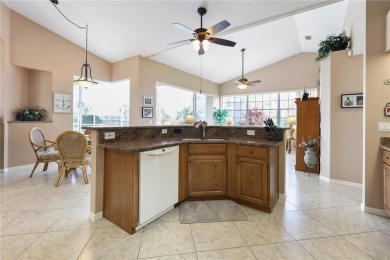 Privacy abounds with this well maintained 3/2/2 pool home on Pinemoor West Golf Club in Florida - for sale on GolfHomes.com, golf home, golf lot