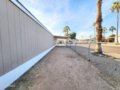 This stunning 2-bedroom, 2-bathroom home has been completely on Country Meadows Golf Club in Arizona - for sale on GolfHomes.com, golf home, golf lot