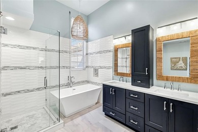 Light-filled and beautifully appointed, this top-floor on Bonita Bay West in Florida - for sale on GolfHomes.com, golf home, golf lot