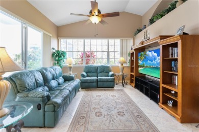 Privacy abounds with this well maintained 3/2/2 pool home on Pinemoor West Golf Club in Florida - for sale on GolfHomes.com, golf home, golf lot